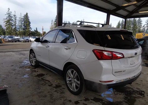 2018 Chevrolet Equinox Premier из США, поврежденный, VIN 2GNAXWEX4J6236921